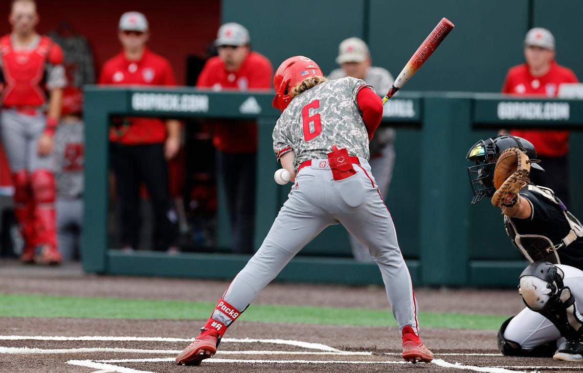 N.C. State’s Matt Heavner (6) is hit by the pitch in the fourth inning during N.C. State’s game against James Madison in the NCAA Raleigh Regional final at Doak Field Sunday, June 2, 2024.