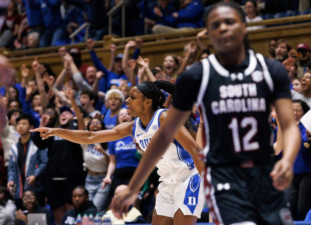 Duke’s Oluchi Okananwa celebrates a made three-pointer during the first half of the Blue Devils’ game against South Carolina on Sunday, Dec. 3, 2023, at Cameron Indoor Stadium in Durham, N.C.