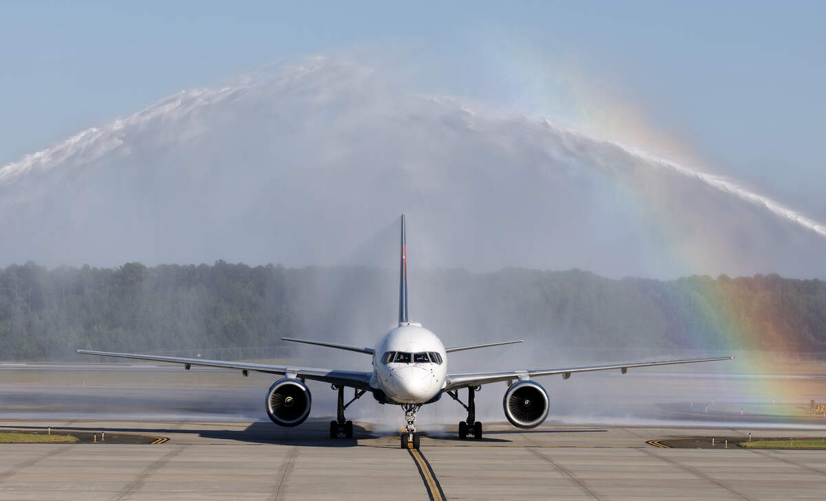A plane carrying the Carolina Hurricanes team is greeted by a water salute after arriving at Raleigh-Durham International Airport on Monday, June 15, 2026.