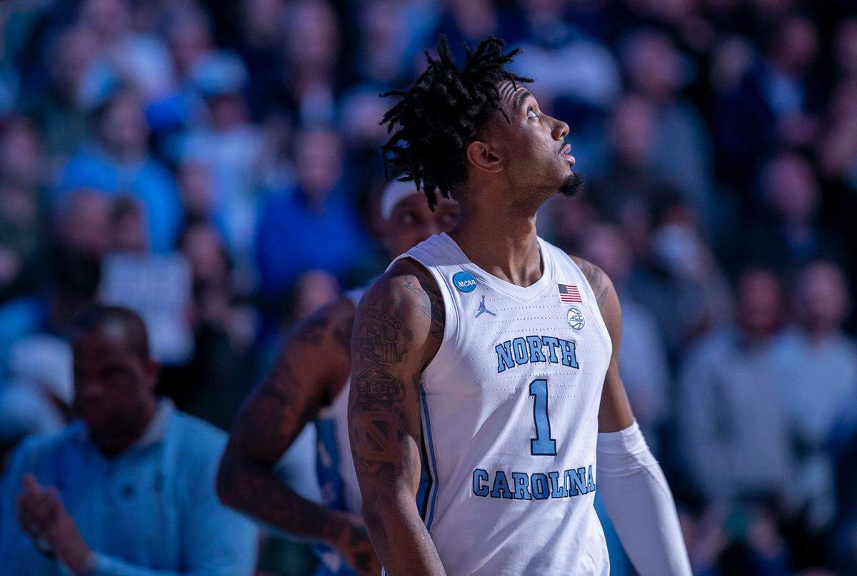 North Carolina’s Leaky Black (1) glances at the scoreboard as he introduced into the starting line up prior to the Tar Heels’ game against Saint Peter’s in the NCAA East Regional final on Sunday, March 27, 2022 at Wells Fargo Center in Philadelphia, Pa.