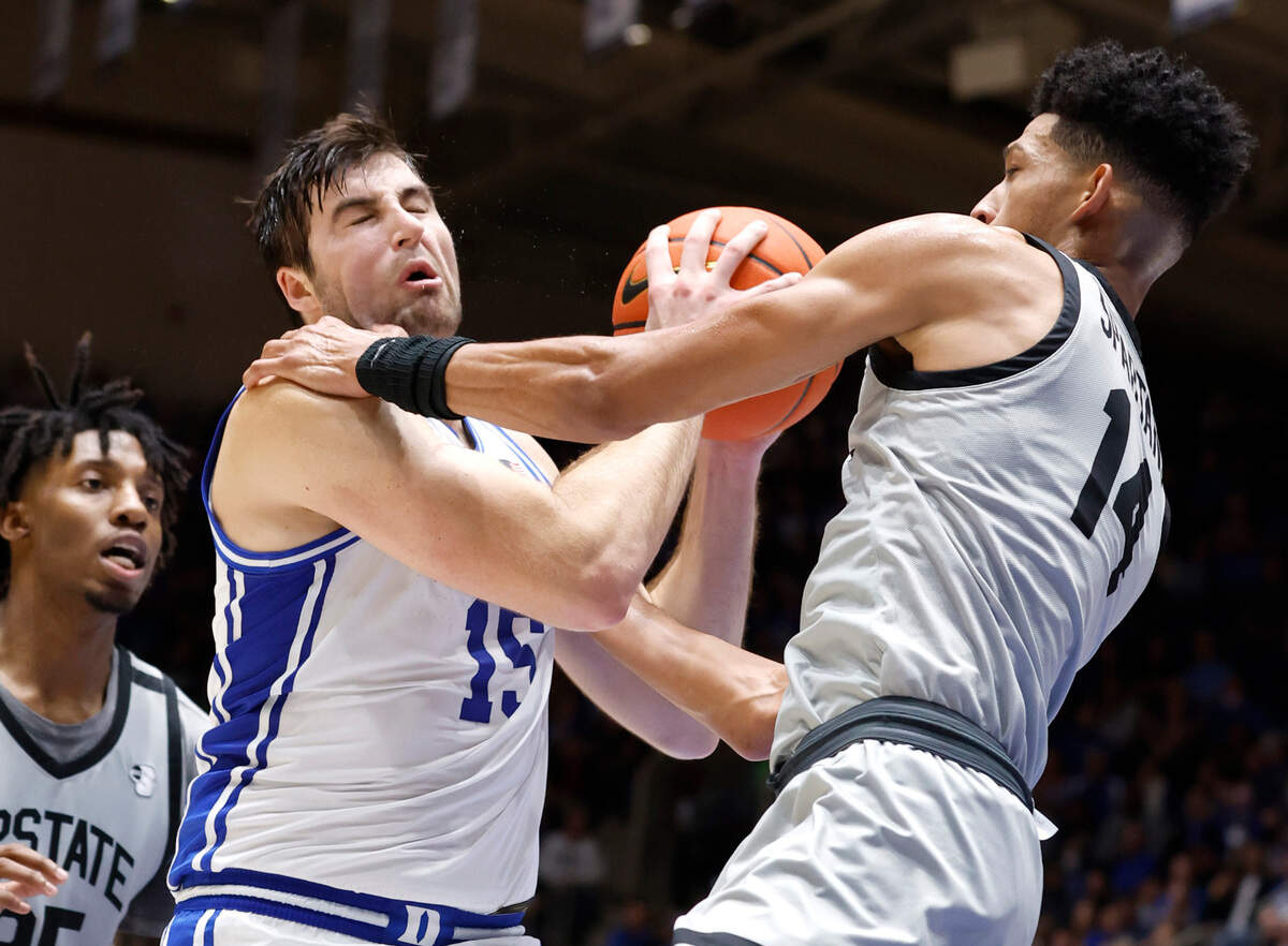 Duke’s Ryan Young (15) is fouled by USC Upstate’s Floyd Rideau Jr. (14) during the first half of Duke’s game against USC Upstate at Cameron Indoor Stadium in Durham, N.C., Friday, Nov. 11, 2022.