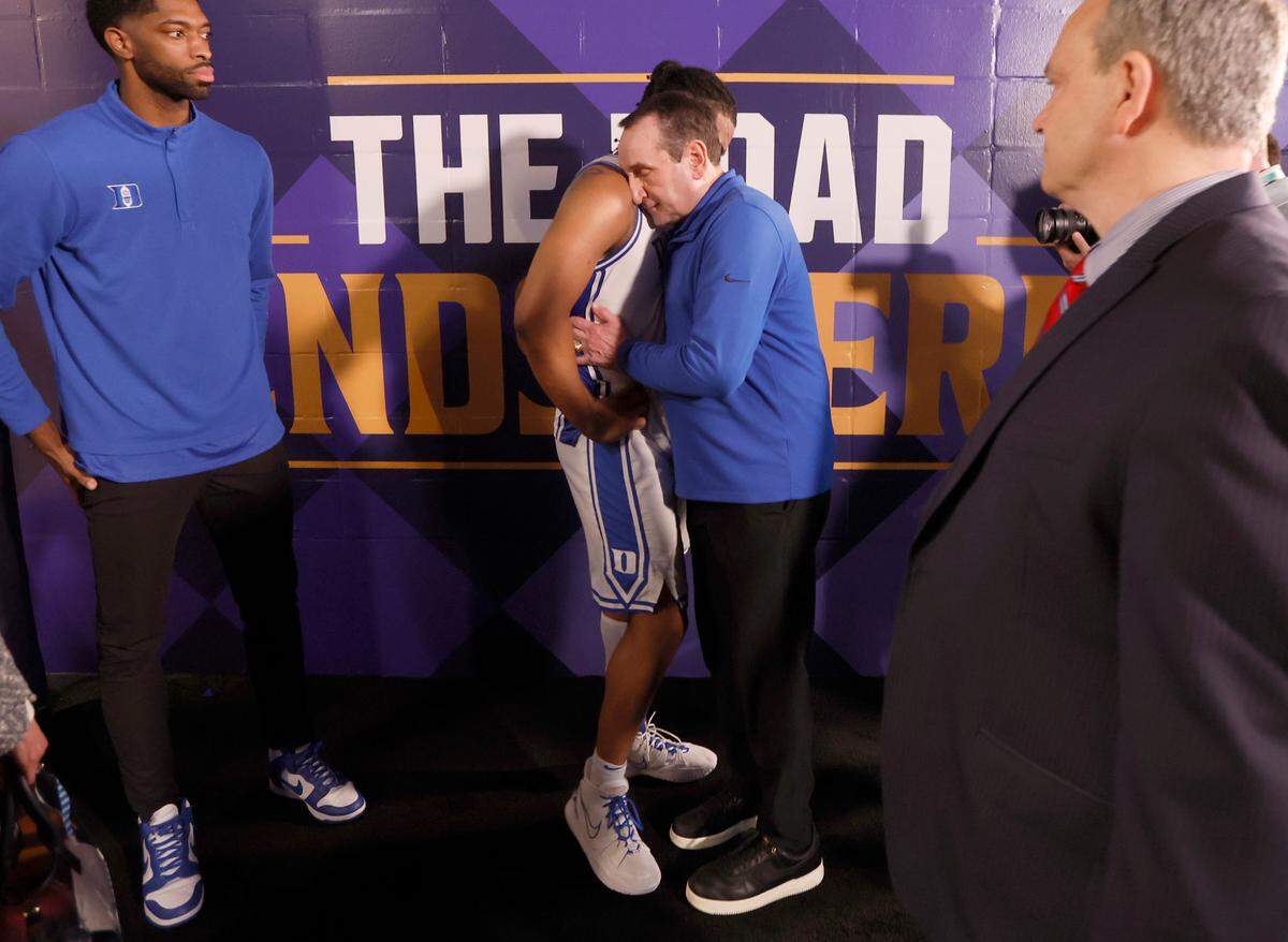 Duke head coach Mike Krzyzewski hugs Trevor Keels (1) after UNC’s 81-77 victory over Duke in the Final Four at Caesars Superdome in New Orleans, La., Saturday, April 2, 2022.