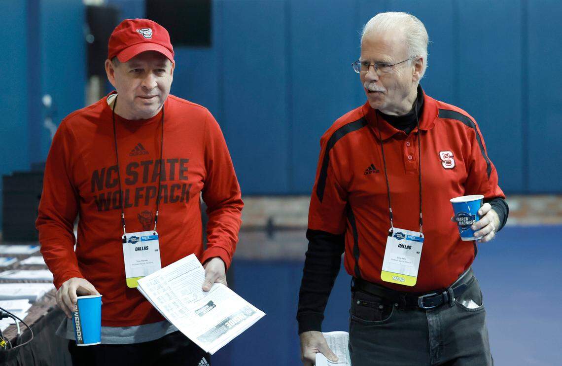 N.C. State radio broadcaster Gary Hahn talks with color analyst Tony Haynes at the American Airlines Center in Dallas, Texas, Thursday, March 28, 2024. The Wolfpack will face Marquette in the Sweet 16 of the NCAA Tournament Friday.