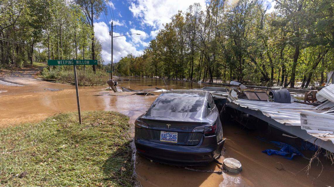 Foodwaters overrun a road in Canton on Friday, Sept. 27, 2024 as the remnants of Hurricane Helene caused flooding, downed trees, and power outages in western North Carolina.