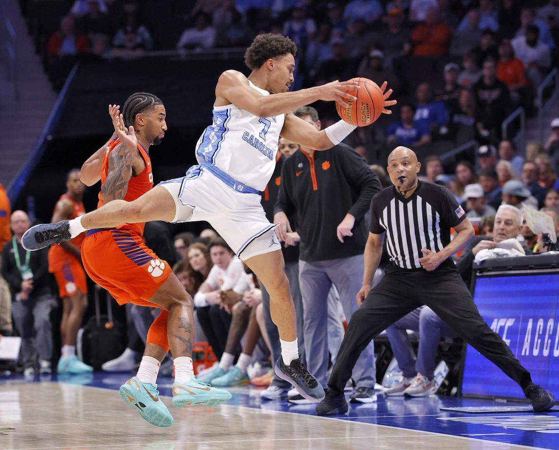 North Carolina's Seth Trimble attempts to save the ball from going out of bounds during the first half of the Tar Heels’ ACC Tournament quarterfinal game against Clemson on Thursday, March 12, 2026, at the Spectrum Center in Charlotte, N.C. 