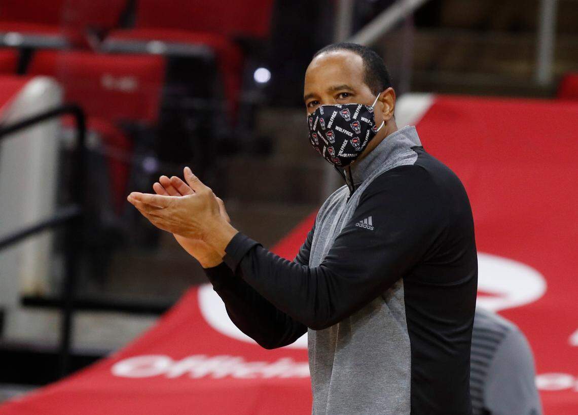 N.C. State head coach Kevin Keatts cheers on his team during the first half of N.C. State’s game against Wake Forest at PNC Arena in Raleigh, N.C., Wednesday, January 27, 2021.