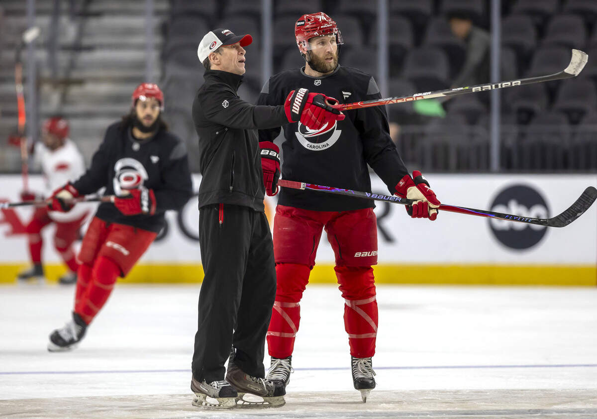 Carolina Hurricanes coach Rod Brind’Amour works with defenseman Jacoob Slavin (74) during practice on Monday, June 8, 2026 at T-Mobile Arena in Las Vegas, NV.