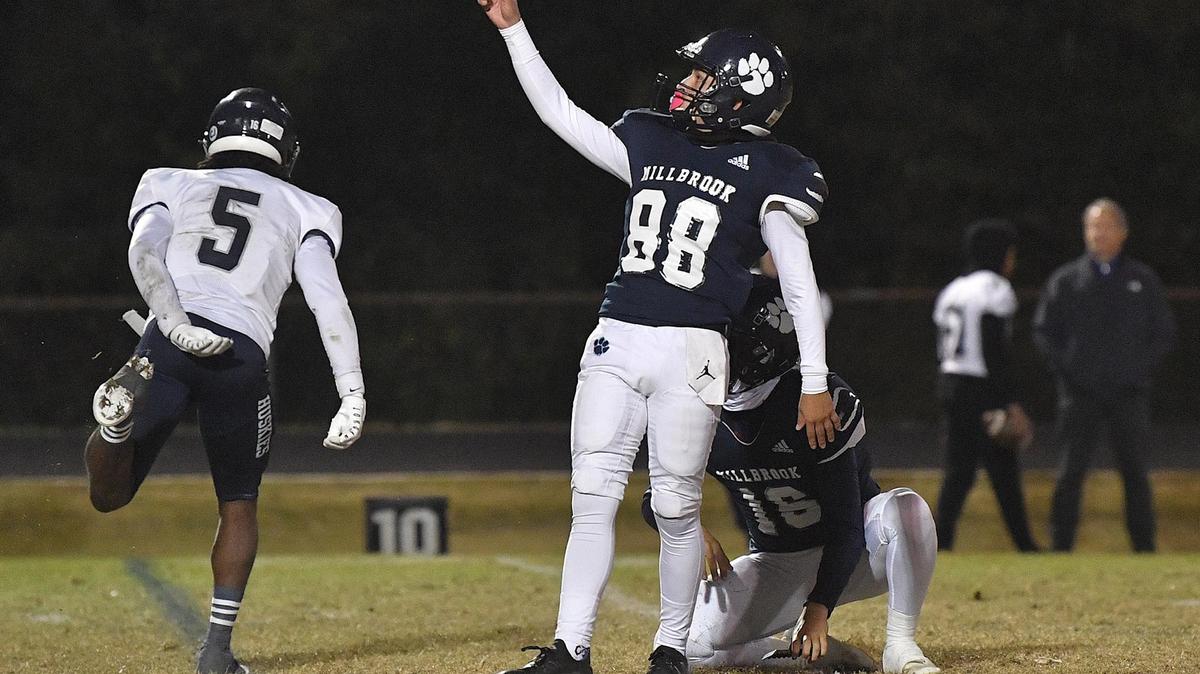 Millbrook kicker Angel Gomez (88) reacts after making the extra point against Heritage in the first half. The Millbrook Wildcats and the Heritage Huskies met in a NCHSAA 4A playoff first round game in Raleigh, N.C. on November 3, 2023.