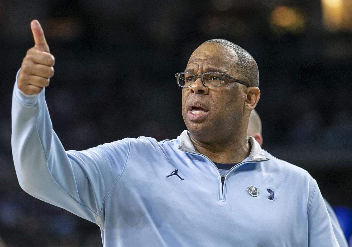 North Carolina head coach Hubert Davis directs his team on defense in the first half against Kansas during the NCAA Championship game on Monday, April 4, 2022 at Caesars Superdome in New Orleans, La.