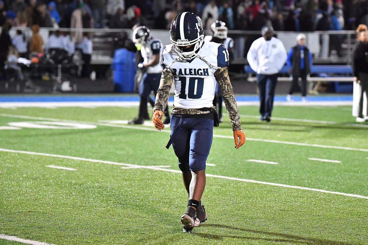 Southeast Raleigh defensive back Mykale Tinsley (10) walks  towards the  end zone after his team's loss to Clayton in thew NCHSAA 7A fourth round. The Clayton Comets and the Southeast Raleigh Bulldogs met in the fourth round of the NCHSAA 7A Playoffs in Clayton, N.C. on November 28, 2025.
