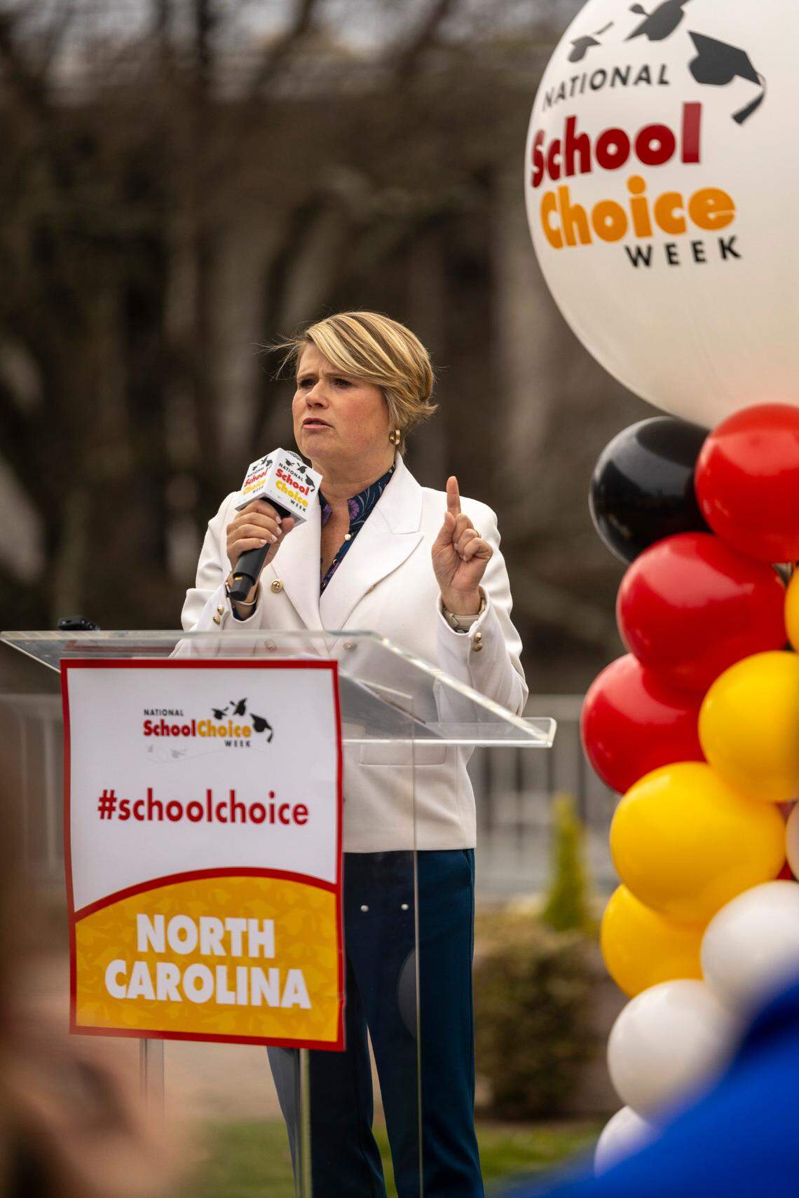 Catherine Truitt, the Republican state superintendent of public instruction, speaks during a rally celebrating National School Choice Week on Halifax Mall in front of the Legislative Building in Raleigh on Jan. 24. North Carolina could see a 60% increase this year in the number of students receiving a private school voucher now that income limits for families have been removed.
