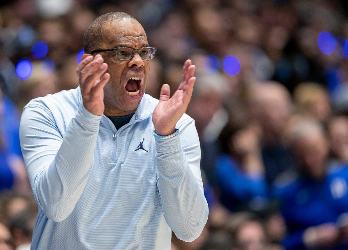 North Carolina coach Hubert Davis directs his team defense in the first half against Duke on Saturday, February 4, 2023 at Cameron Indoor Stadium in Durham, N.C.