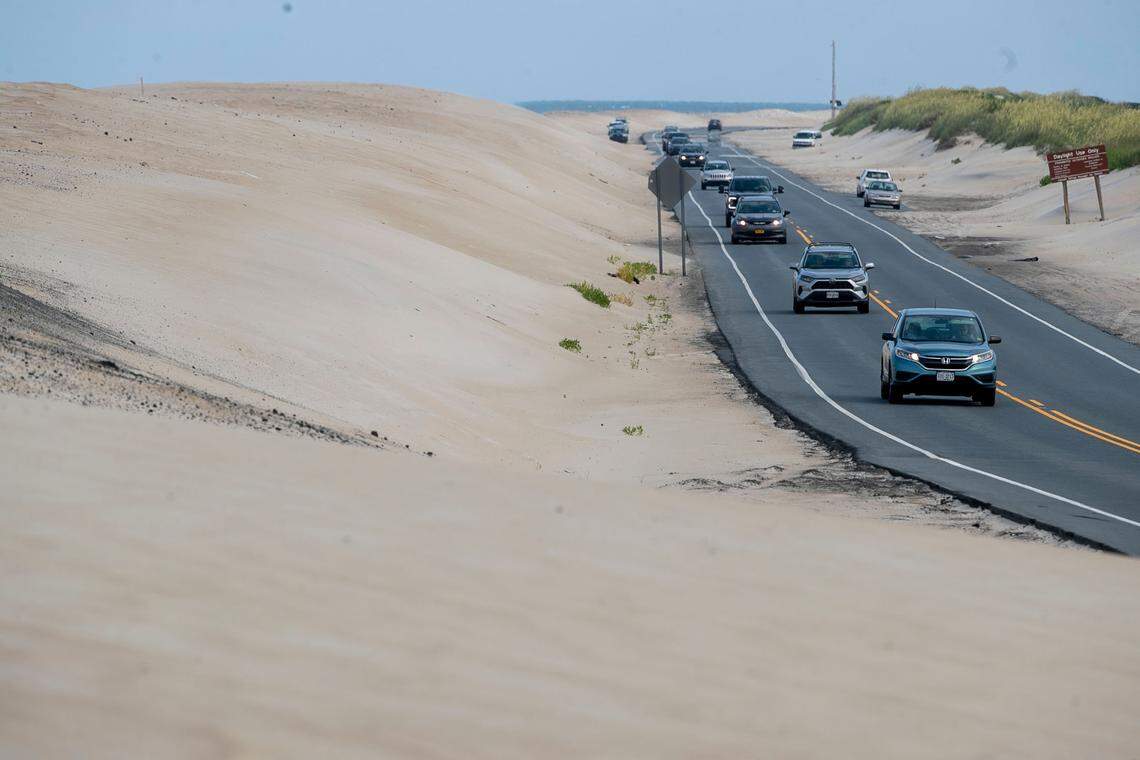 Traffic on NC 12 in the Canal Zone at the south end of the Marc Basnight Bridge, one of the hot spots of the highway that is vulnerable to erosion and flooding during storms on Wednesday, July 21, 2021.