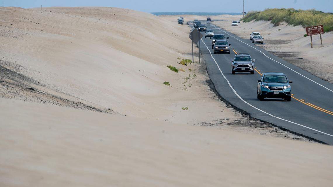 Traffic on NC 12 in the Canal Zone at the south end of the Marc Basnight Bridge, one of the hot spots of the highway that is vulnerable to erosion and flooding during storms on Wednesday, July 21, 2021.