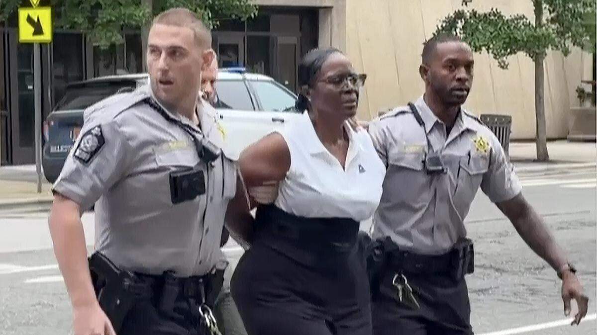 Woman accused of shooting attorneys at Raleigh courthouse has history of lawsuits