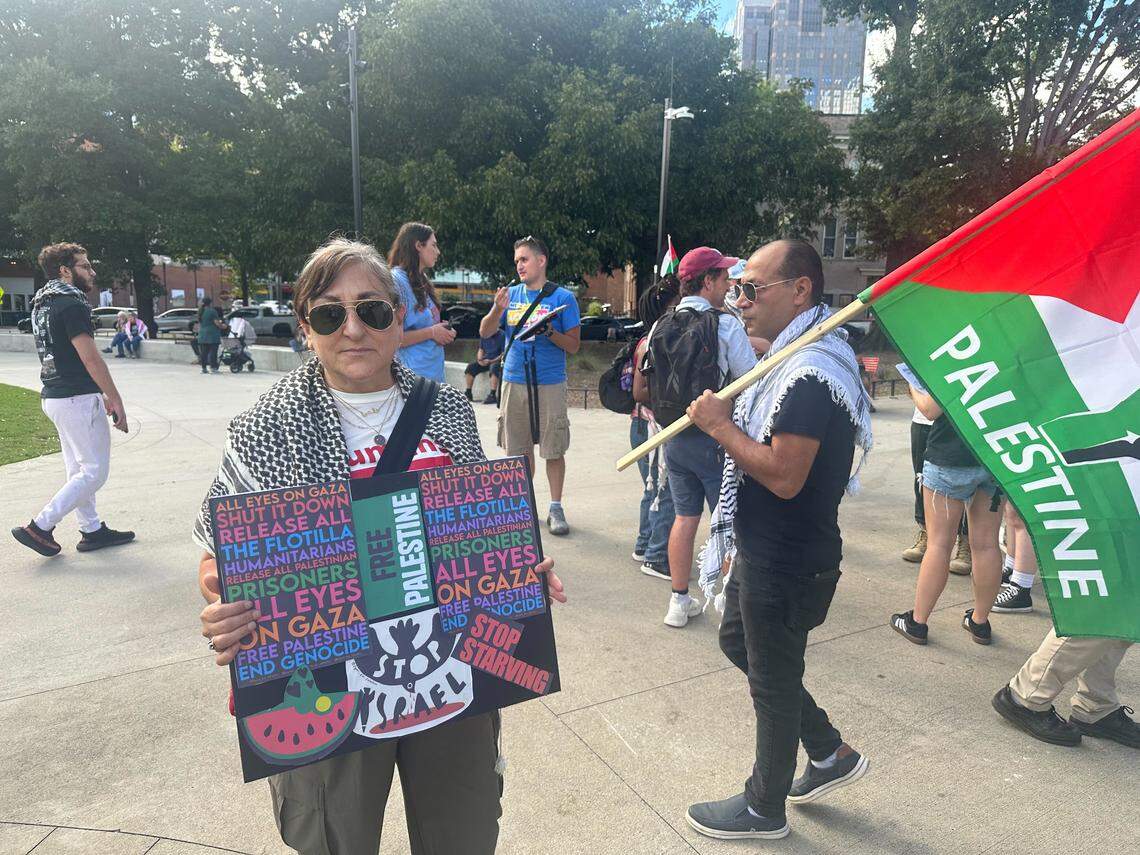 Lisa Thalji holds up a sign during a rally calling for the end of the Israel-Hamas War. Hundreds marched on Sunday, October 5, 2025 in downtown Raleigh during the “Rise Up for Gaza” rally.