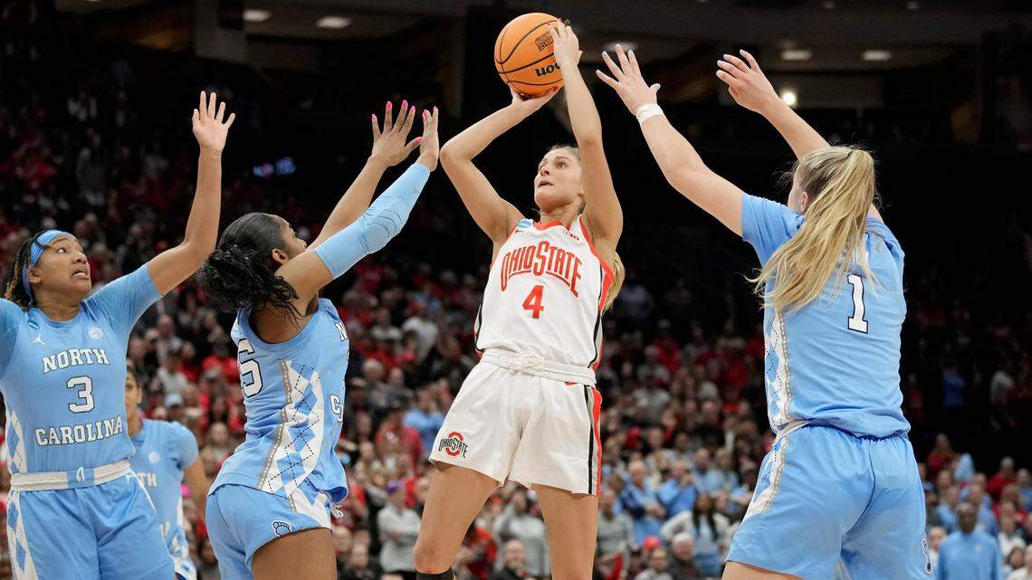 Ohio State Buckeyes guard Jacy Sheldon (4) makes the game winning shot against North Carolina Tar Heels guard Deja Kelly (25) during the fourth quarter of the NCAA second round game.