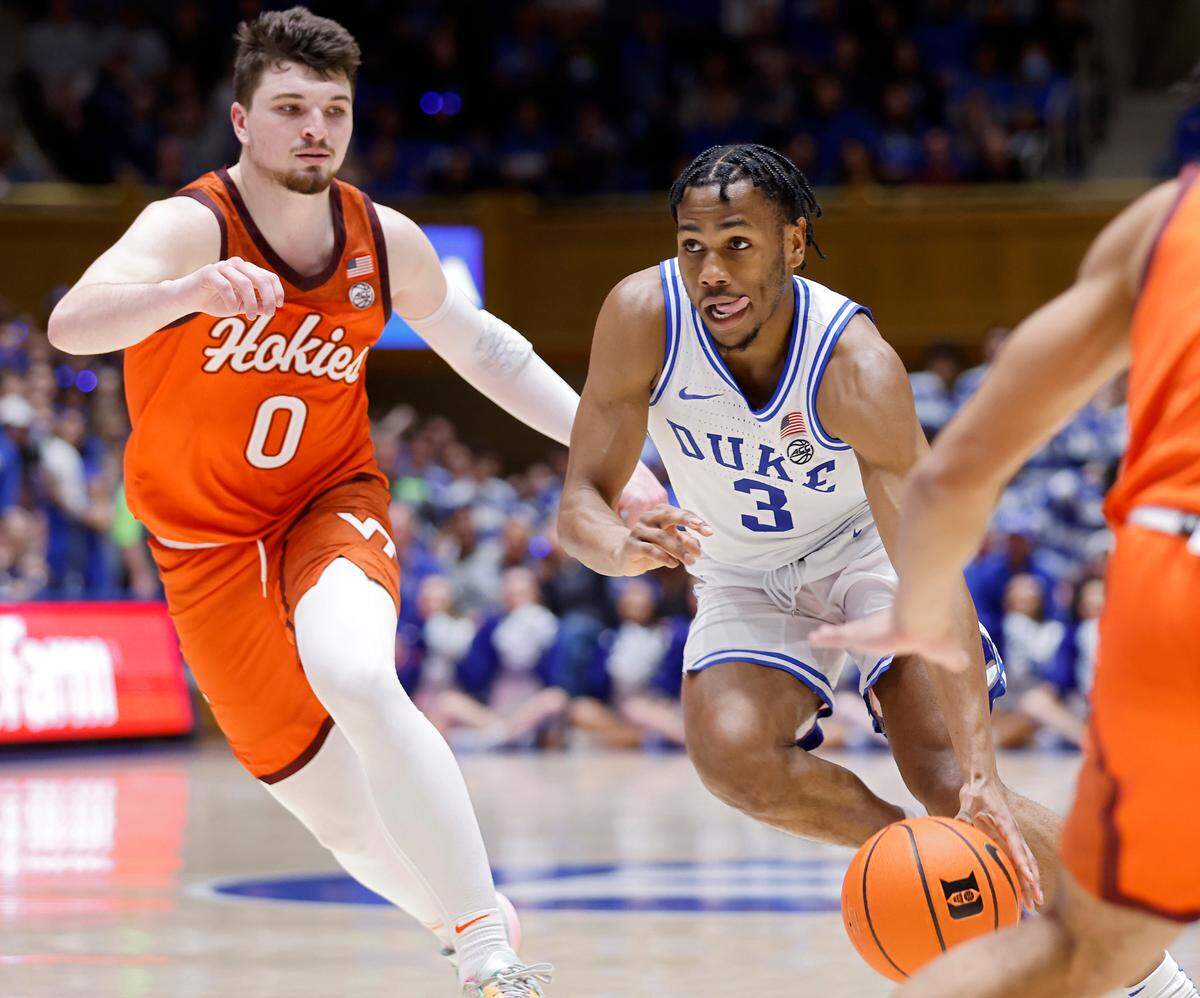 Duke’s Jeremy Roach drives past Virginia Tech’s Hunter Cattoor during the second half of the Blue Devils’ 81-65 win over Virginia Tech on Saturday, Feb. 25, 2023, at Cameron Indoor Stadium in Durham, N.C.