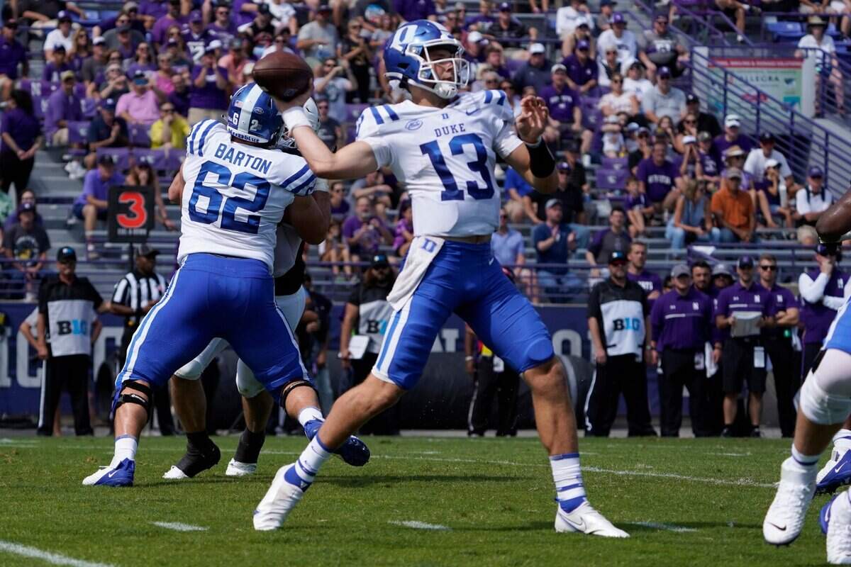 Duke quarterback Riley Leonard (13) looks to pass against Northwestern during the first half of an NCAA college football game, Saturday, Sept.10, 2022, in Evanston, Ill.