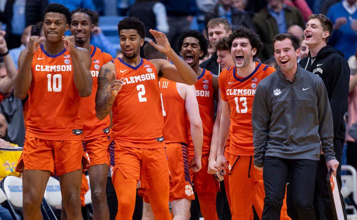 Clemson’s Dillion Hunter (2) leads the celebration on the Tigers’ bench as time expires and they secure their 80-76 victory over North Carolina on Tuesday, February 6, 2024 at the Dean E. Smith Center in Chapel Hill, N.C.