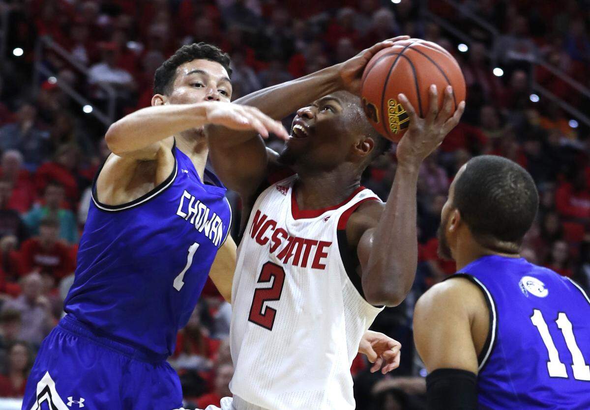 N.C. State’s Torin Dorn (2) drives to the basket as Chowan’s Robert Grubbs (1) defends during the first half of N.C. State’s exhibition game against Chowan at PNC Arena in Raleigh, N.C., Monday, Oct. 29, 2018.