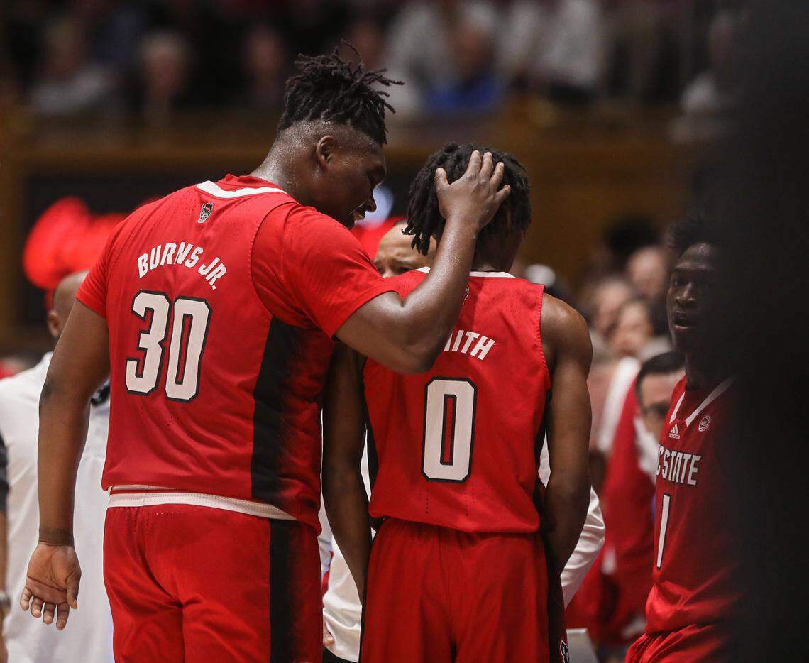 N.C. State’s D.J. Burns Jr. speaks with Terquavion Smith after Smith was assessed a technical foul during the first half of the Wolfpack’s 71-67 loss to Duke on Tuesday, Feb. 28, 2023, at Cameron Indoor Stadium in Durham, N.C.
