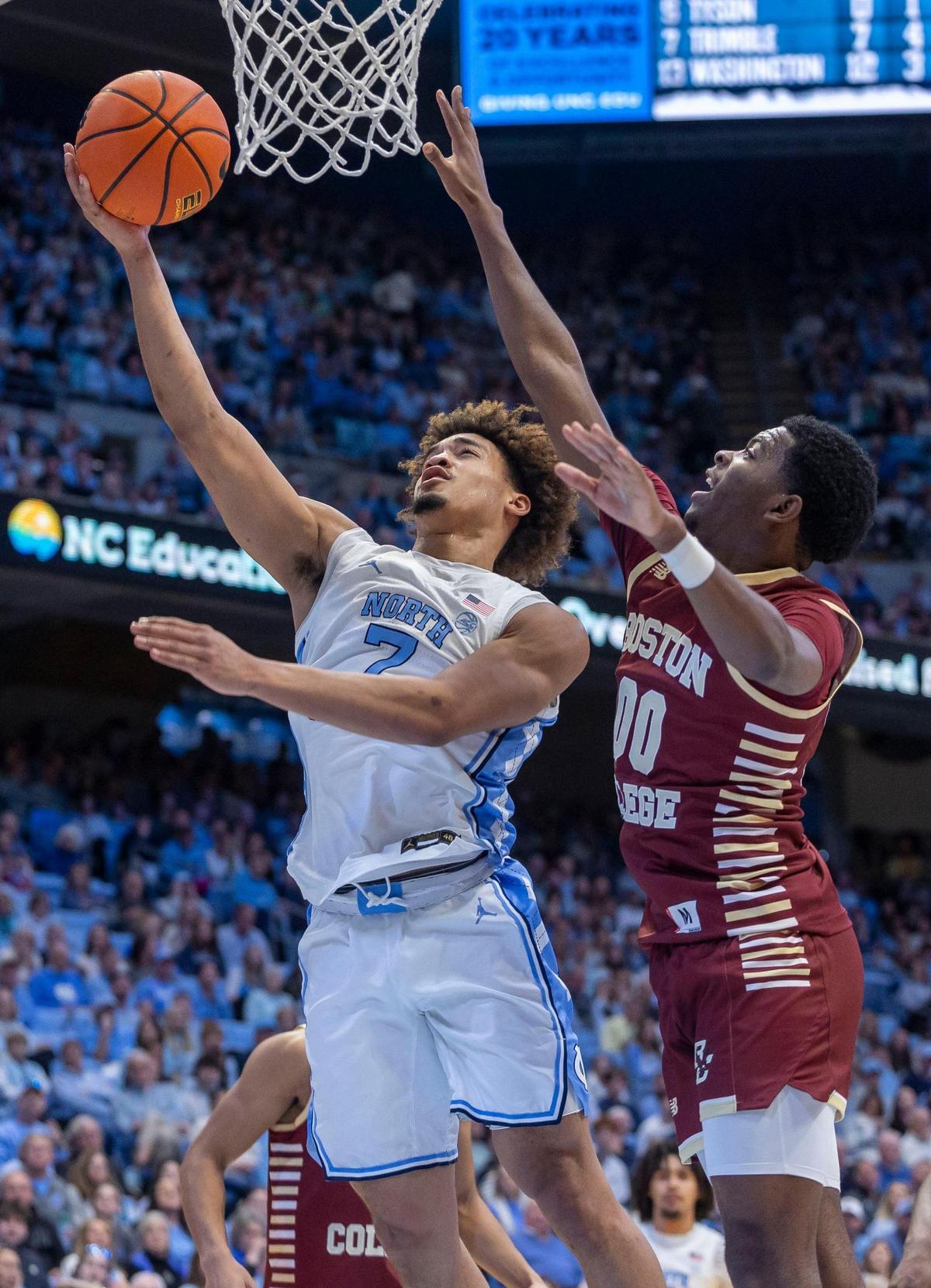 North Carolina guard Seth Trimble (7) drives to the basket against Boston College guard Chas Kelley III (00) in the first half on Saturday, January 25, 2025 at the Smith Center in Chapel Hill, N.C.