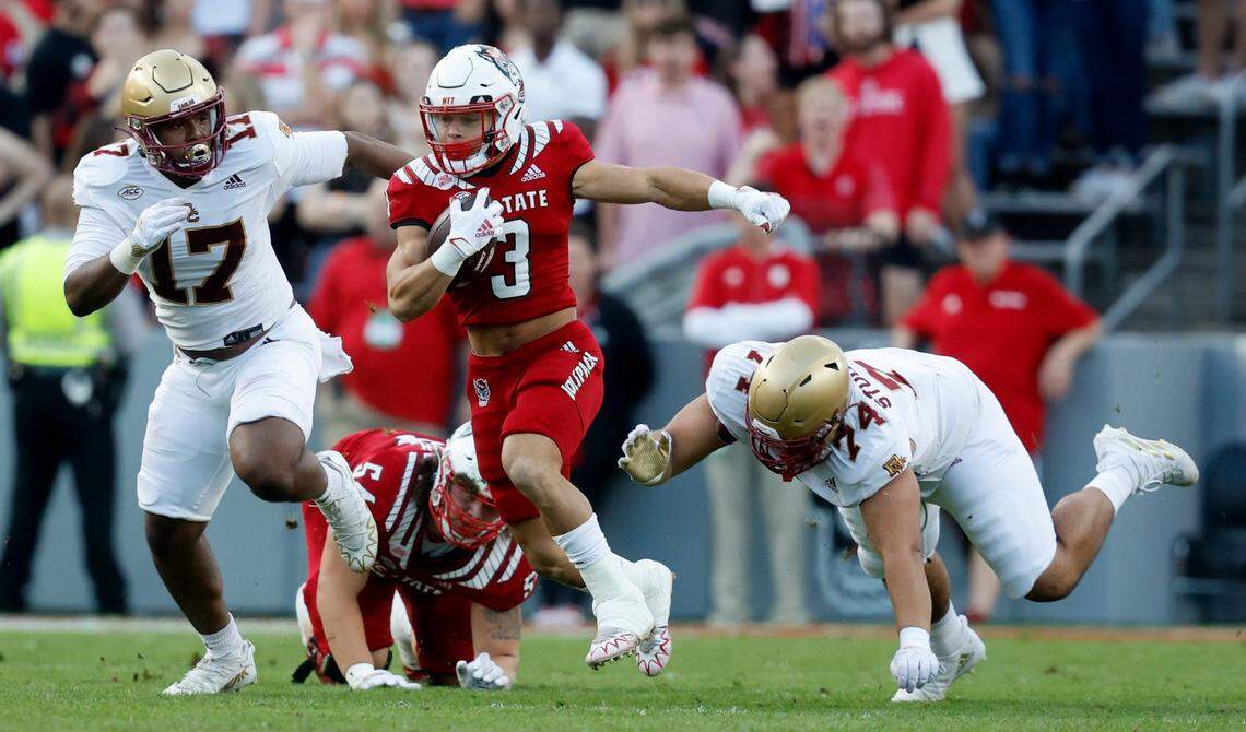 N.C. State running back Jordan Houston (3) breaks free for yards during the first half of N.C. State’s game against Boston College at Carter-Finley Stadium in Raleigh, N.C., Saturday, Nov. 12, 2022.