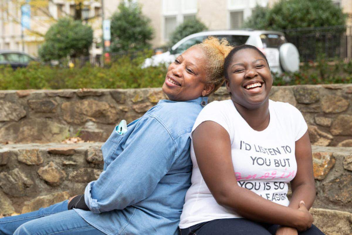 Faye Alston and her daughter Precious share a laugh on UNC-Chapel Hill’s campus.