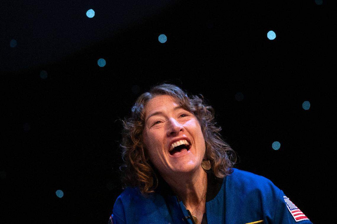 Christina Koch, a NASA astronaut and NC State alumna, smiles while speaking with NC State Chancellor Randy Woodson during his annual fall address on Monday, Oct. 23, 2023, in Talley Student Union’s Stewart Theater. Koch will be a part of the Artemis II moon mission.