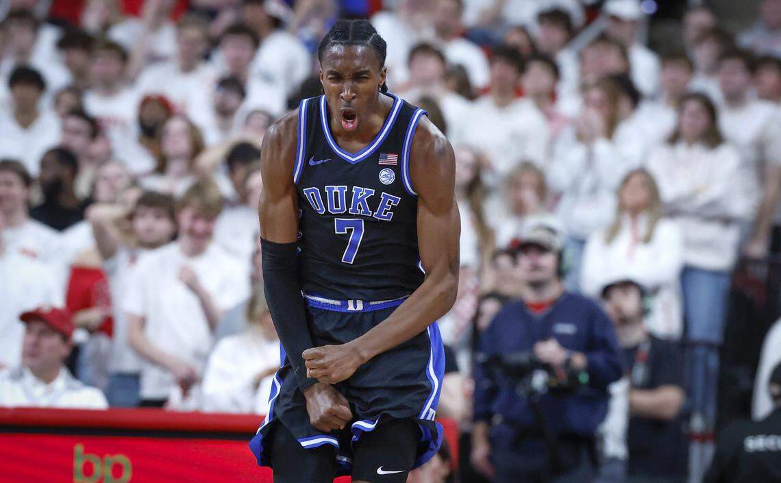 Duke’s Dame Sarr (7) celebrates hitting a three-pointer during the first half of Duke’s game against N.C. State at the Lenovo Center in Raleigh, N.C., Monday, March 2, 2026.