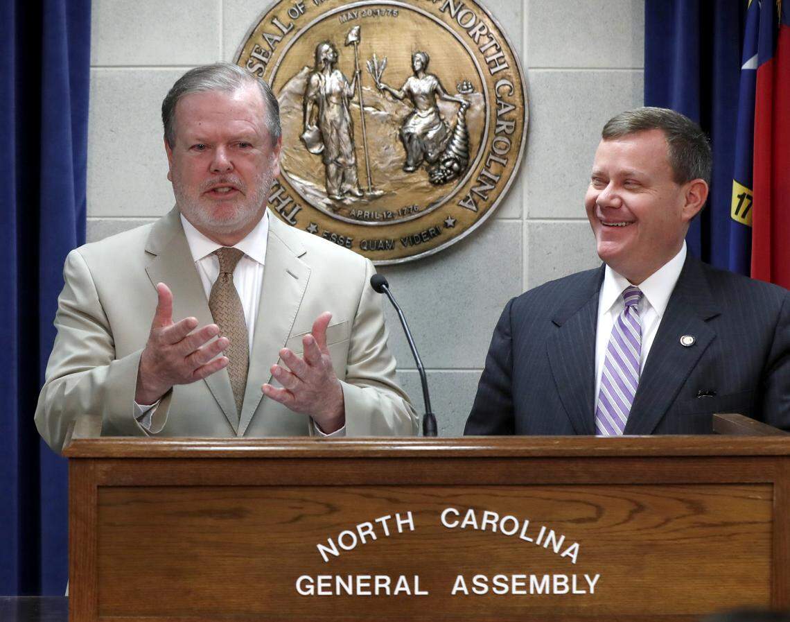 N.C. Senate President Pro Tem Phil Berger, left, and N.C. House Speaker Tim Moore talk during a news conference at the Legislative Building in Raleigh, N.C., Thursday, May 17, 2018. They talked about  proposed changes to economic-development incentives.