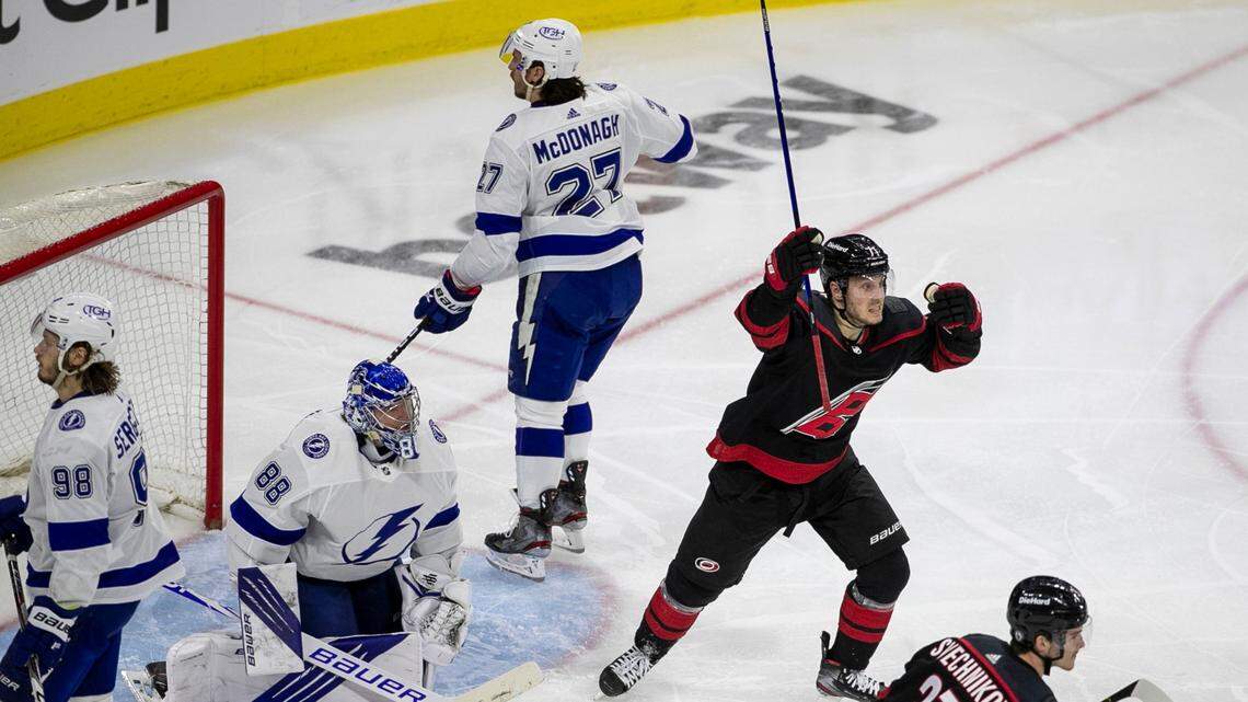 Carolina Hurricanes’ Jesper Fast (71) reacts after a goal by teammate Jake Bean (24) to tie Tampa Bay 1-1 in the third period of game one of their second round Stanley Cup series on Sunday, May 30, 2021 at PNC Arena in Raleigh, N.C.
