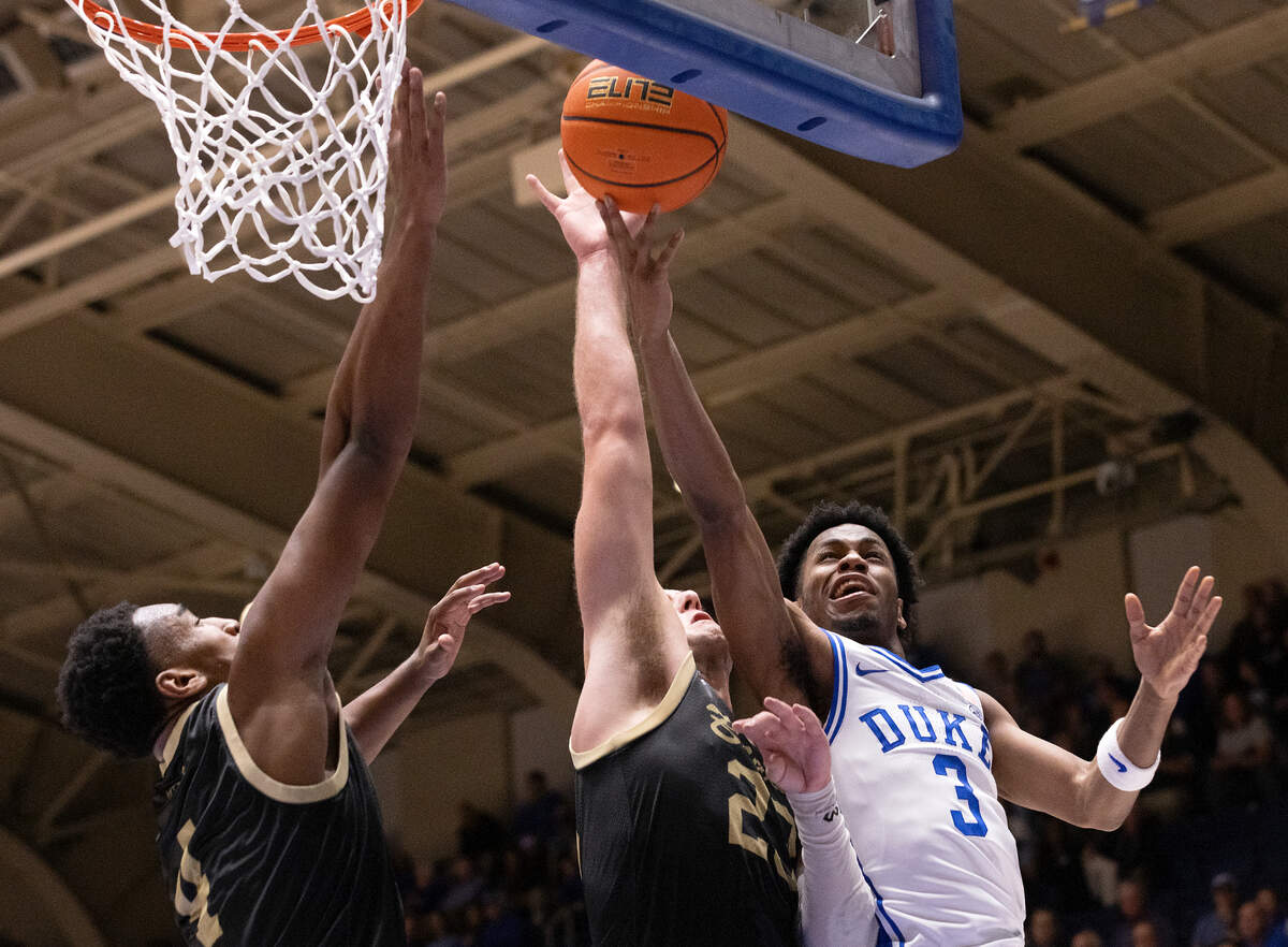 Duke’s Jeremy Roach drives to the basket past UNC Pembroke’s Amare Miller and Steven Lassiter during the first half of the Blue Devils’ 109-64 exhibition win on Wednesday, Nov. 1, 2023, at Cameron Indoor Stadium in Durham, N.C.