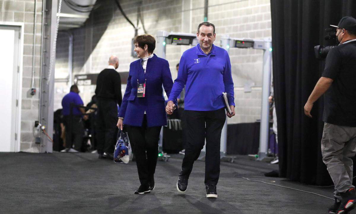 Duke head coach Mike Krzyzewski and his wife Mickie walk into the Chase Center in San Francisco, Calif., before Dukes game against Texas Tech in the Sweet 16 round of the NCAA Tournament Thursday, March 24, 2022.