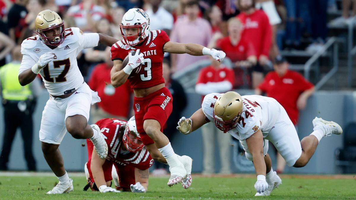 N.C. State running back Jordan Houston (3) breaks free for yards during the first half of N.C. State’s game against Boston College at Carter-Finley Stadium in Raleigh, N.C., Saturday, Nov. 12, 2022.