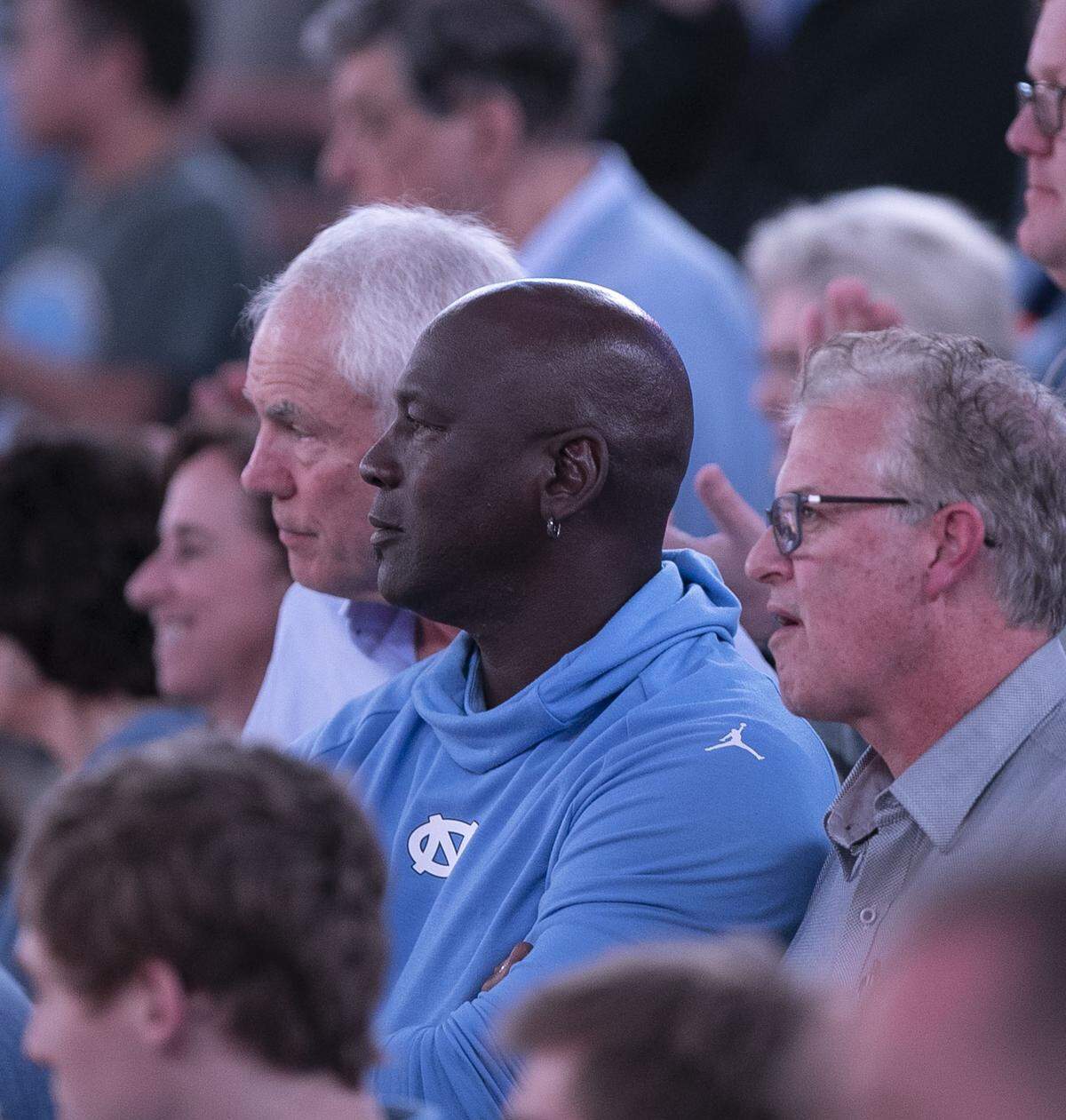 Former Tar Heels, from left, Mitch Kupchak, Michael Jordan and Buzz Peterson were in attendance for North Carolina’s game against Virginia on Monday, February 11, 2019 at the Smith Center in Chapel Hill, N.C.
