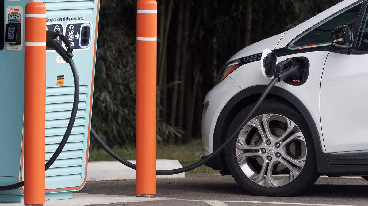 A vehicle charges at an IONNA “rechargery,” an electric vehicle charging station, in Apex on Jan. 5, 2026. 


