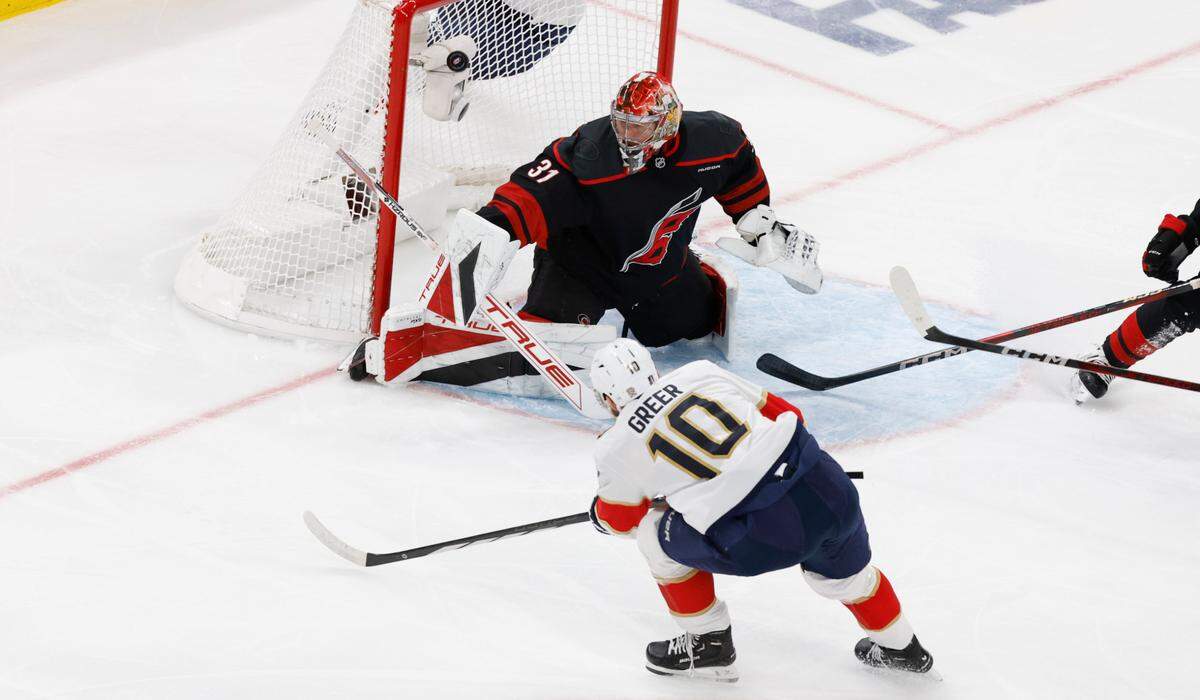 Panthers’ A.J. Greer (10) scores on Carolina’s Frederik Andersen (31) during the second period of the Carolina Hurricanes’ game against the Florida Panthers in Game 1 of the Eastern Conference Finals at the Lenovo Center in Raleigh, N.C., Tuesday, May 20, 2025.