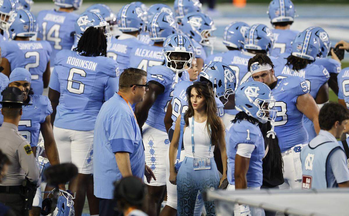 Jordon Hudson stands on the sidelines as the North Carolina warms up before UNC’s game against TCU at Kenan Stadium in Chapel Hill, N.C., Monday, Sept. 1, 2025.