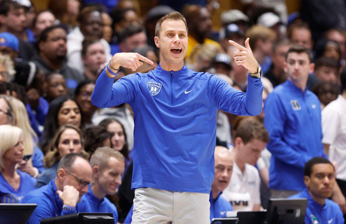 Duke head coach Jon Scheyer yells to his team during the first half of Duke’s game against Virginia Tech at Cameron Indoor Stadium in Durham, N.C., Tuesday, Dec. 31, 2024.