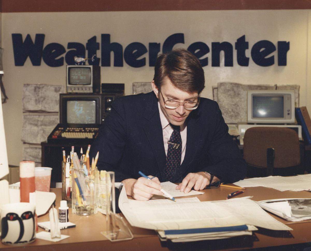 Chief Meteorologist Greg Fishel studying the charts in the WRAL WeatherCenter in the 1980s.