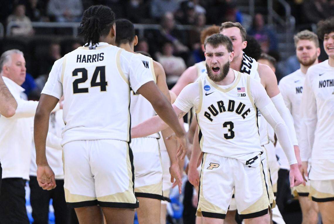 Purdue Boilermakers guard Braden Smith (3) celebrates with guard Gicarri Harris (24) during the first half of a second round men’s NCAA Tournament game against the McNeese State Cowboys at Amica Mutual Pavilion.