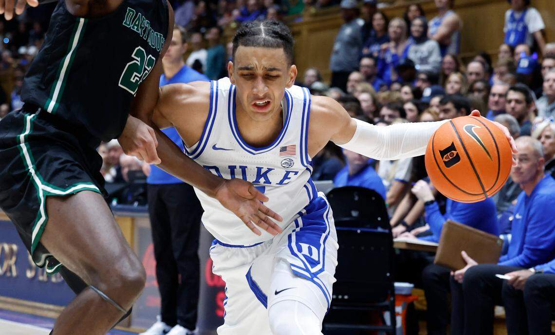 Duke’s Tyrese Proctor (5) keeps the ball from Dartmouth’s Jayden Williams (22) during the second half of Duke’s 92-54 victory over Dartmouth at Cameron Indoor Stadium in Durham, N.C., Monday, Nov. 6, 2023.