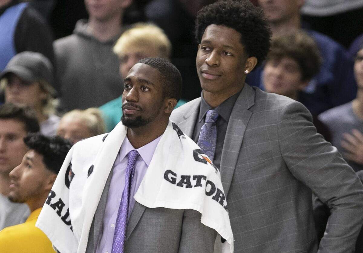 North Carolina’s Brandon Robinson and Sterling Manley, both out with injuries, watch the second half against UNC-W on Friday, November 8, 2019 at Trask Coliseum in Wilmington, N.C.
