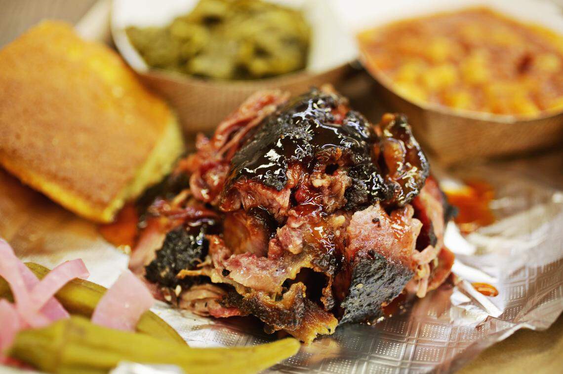 Redneck BBQ Lab’s pulled pork is served here with a side of collards, Brunswick stew, cornbread and pickles. The restaurant will be opening a second location in Raleigh’s North Hills.