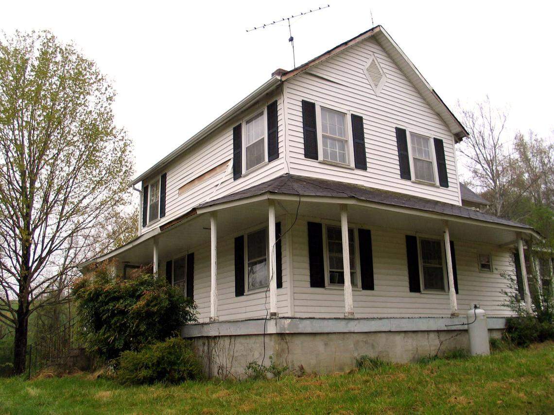 This Wilkes County farmhouse shown on April 12, 2007, in Traphill, N.C., was once owned by Siamese twins Eng and Chang Bunker.  It's a white farmhouse by a creek and cool springs, nestled against the Blue Ridge Mountains in what the original Siamese twins described as "the garden spot of the world."