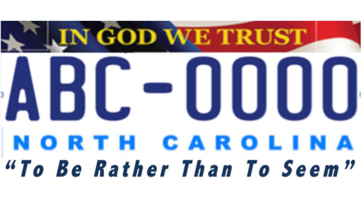 This is a prototype of the proposed national/state motto license plate. If the General Assembly approves, the plate would be one of three basic license plates offered in North Carolina, along with the First in Flight and First in Freedom versions on vehicles now.