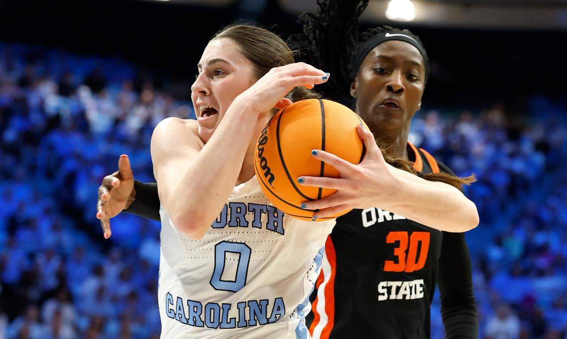 North Carolina’s Lanie Grant (0) drives past Oregon State’s Catarina Ferreira (30) during the first half of UNC’s game against Oregon State in the first round of the NCAA women’s basketball tournament at Carmichael Arena in Chapel Hill, N.C., Saturday, March 22, 2025.