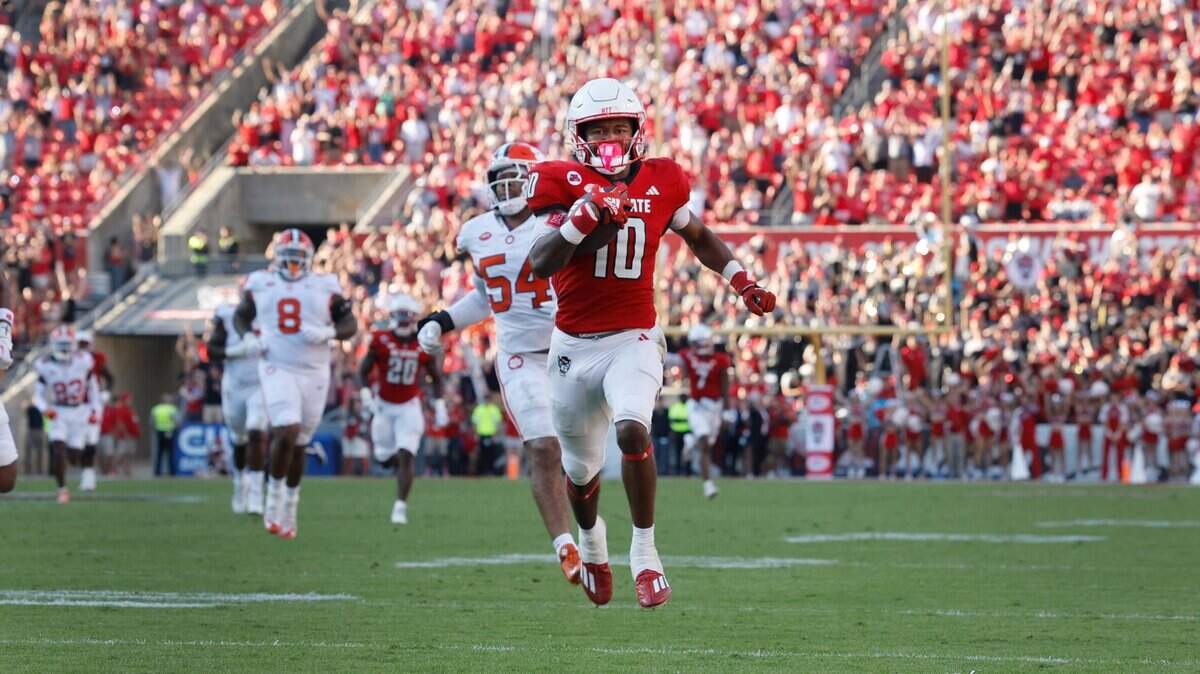 N.C. State wide receiver KC Concepcion (10) heads to the end zone to score on a 72-yard touchdown reception during the second half of N.C. State’s 24-17 victory over Clemson at Carter-Finley Stadium in Raleigh, N.C., Saturday, Oct. 28, 2023.